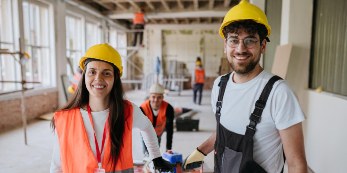 Construction workers inside a building